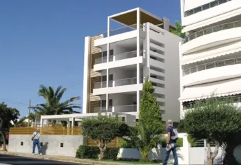 Luxury minimalist apartment building in Glyfada at Zerva 64, designed by ISV Architects and built by Skotidas Constructions.