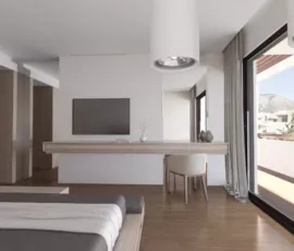 3D rendering of luxury bedroom with floating wooden desk wall-mounted TV and large window with mountain view Alimos