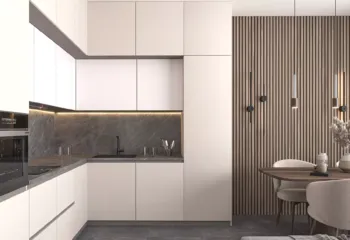 Modern interior design of a high-end apartment kitchen and dining area in Galatsi, featuring white cabinetry, dark stone textures, and a wooden slat wall.