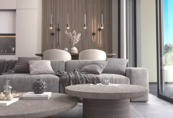 Interior 3D architectural rendering of a luxury apartment living room in Galatsi, featuring a plush grey sofa, stone coffee tables, and slatted wood wall panels.