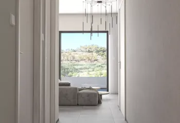 Interior view of a minimalist apartment hallway in Galatsi, featuring clean lines, premium flooring, and subtle lighting design.