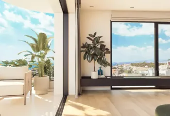 Embracing the Mediterranean light. Project: Ikarou 7 | Developer: Thekla Constructions. Bright luxury penthouse living room in Alimos with sun-drenched terrace modern indoor plants and panoramic sea view by Thekla Constructions