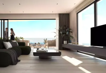 High-tech entertainment in a high-end setting. Project: Ikarou 7 | Developer: Thekla Constructions. Luxury penthouse living room in Alimos featuring a large flat-screen TV modern ethanol fireplace and floor-to-ceiling windows with sea view by Thekla Constructions