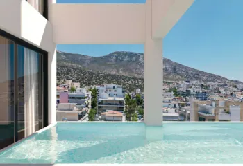 Where the water meets the horizon | Penthouse view at Amerikis 2, Ano Glyfada. Architectural 3D rendering of an infinity pool on a luxury penthouse terrace in Ano Glyfada, overlooking the city and mountains.