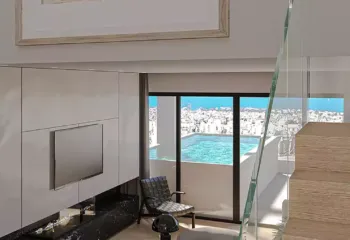 Sophisticated duplex living at Amerikis 2 | View from the mezzanine. Interior 3D architectural visualization of a duplex penthouse in Ano Glyfada, showing the view from the wooden staircase towards the living area and rooftop pool.