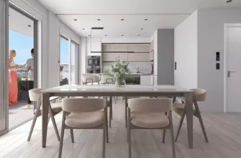 A bright and airy living space at Palaio Faliro Loft, featuring a contemporary modular sofa, minimalist decor, and high-end wooden finishes. Spacious modern living room with white modular sofa and custom furniture in Palaio Faliro Loft
