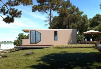 Exterior 3D architectural rendering showcasing the side view of an industrial capsule home with an outdoor dining table, umbrella, and a hammock by the lake.