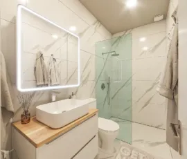 Modern bathroom vanity with led mirror and marble wall tiles in Agios Dimitrios
