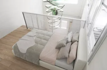 A serene master bedroom located on the upper loft level, overlooking the living area. Modern master bedroom on loft level with minimalist decor in Agios Dimitrios