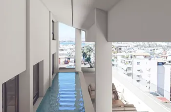 High-end terrace design featuring a private lap pool with sea views at the PLEIADON residence, Palaio Faliro. Luxury balcony swimming pool 3D visualization for PLEIADON project in Palaio Faliro by VARC Studio
