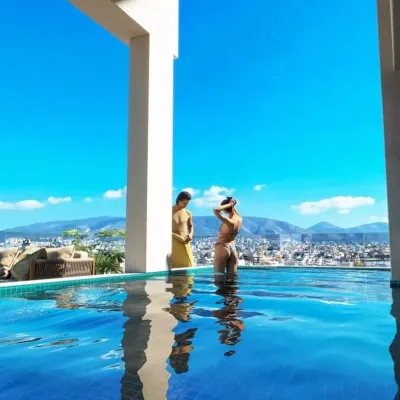 Infinity living with a view over Palaio Faliro. Luxury private infinity pool in a residential project in Palaio Faliro, featuring a panoramic city view and modern architectural design.