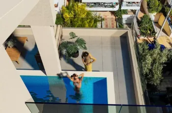 A stunning top-down visualization of the private pool and terrace at PLEIADON penthouse, Palaio Faliro. Top-down view of luxury roof garden with private pool at PLEIADON project in Palaio Faliro by VARC Studio