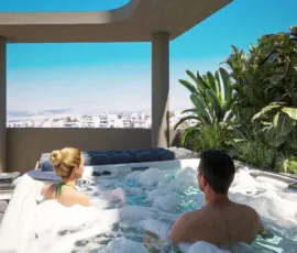 Private oasis in Alimos. Experience luxury outdoor living with our latest architectural visualization project. 3D rendering of a luxury penthouse roof garden in Alimos featuring a private jacuzzi and city view by VARC Studio.