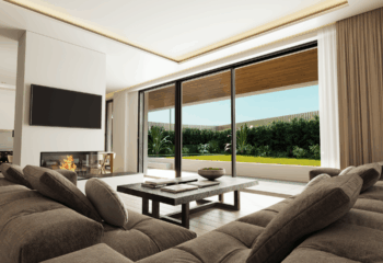 Seamless transition between indoor luxury and outdoor serenity at our Glyfada project. Luxurious open-plan living room with a direct view of a private garden and pool, showcasing high-end 3D Rendering Services in Athens by VARC Studio.