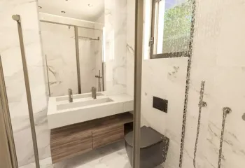 High-end bathroom visualization for our residential project in Glyfada. Modern luxury bathroom with marble walls and wooden vanity, created using professional 3D Rendering Services in Athens.