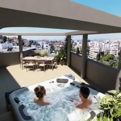 Seamless integration of comfort and design. A perfect example of our luxury terrace projects in the southern suburbs of Athens. Modern roof garden design in Alimos featuring a panoramic view, outdoor dining area, and hot tub visualization by VARC Studio.