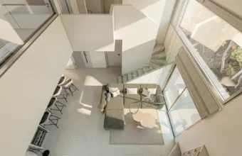 Aerial interior visualization of the Papandreou Famar loft in Alimos, showcasing the open-plan layout, rendered by Varc Studio.