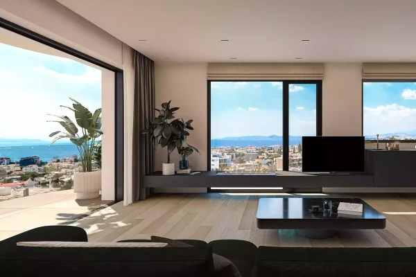 High-end penthouse living room in Alimos with a modern ethanol fireplace large balcony with sea view and minimalist furniture by Thekla Constructions